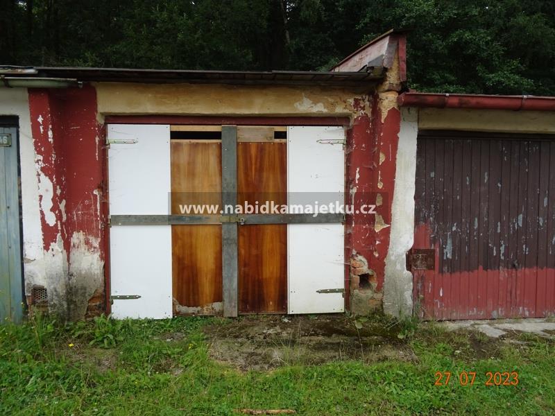 PODÍL 1/2 NA GARÁŽI VČ. POZEMKU P.Č. 444/245 V K.